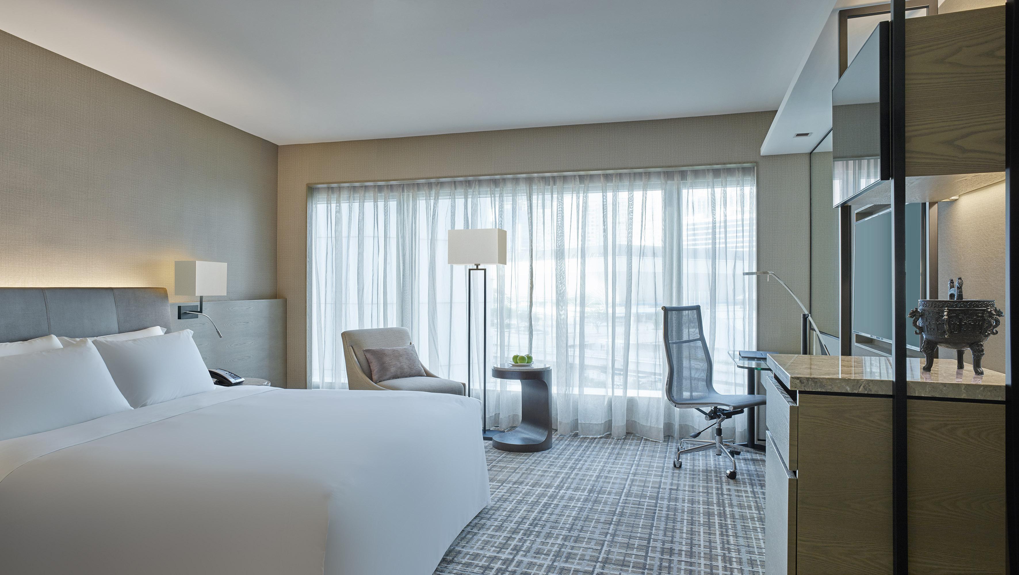 뉴 월드 밀레니엄 홍콩 호텔 외부 사진 A guest room at the hotel